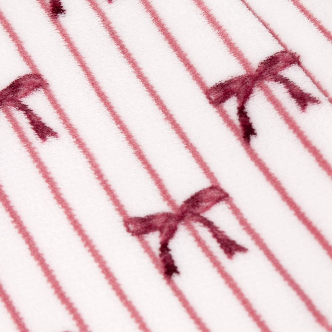 Sherpa Bow Fleece Throw in Silk Pink