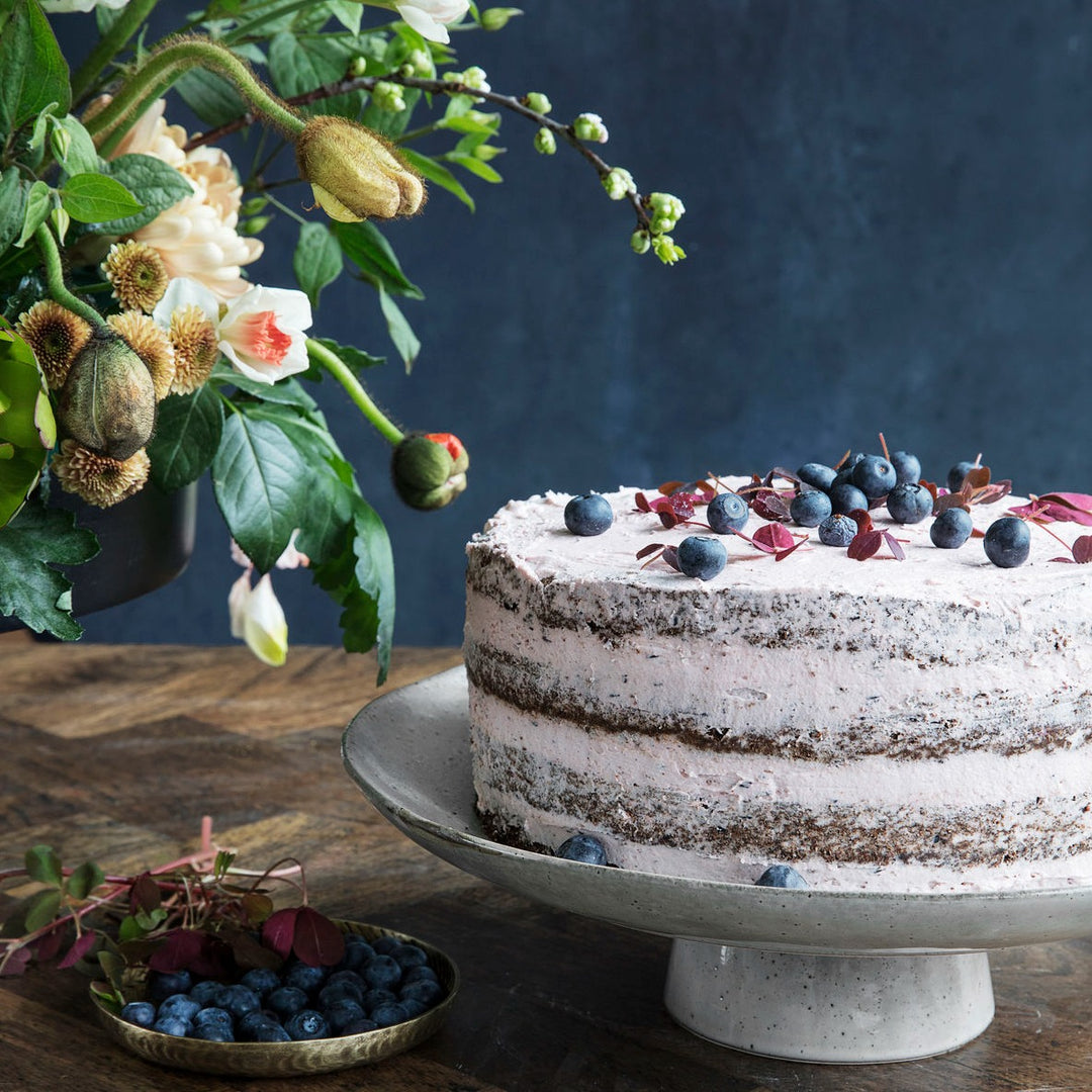 Keramisk kagestativ i grå 