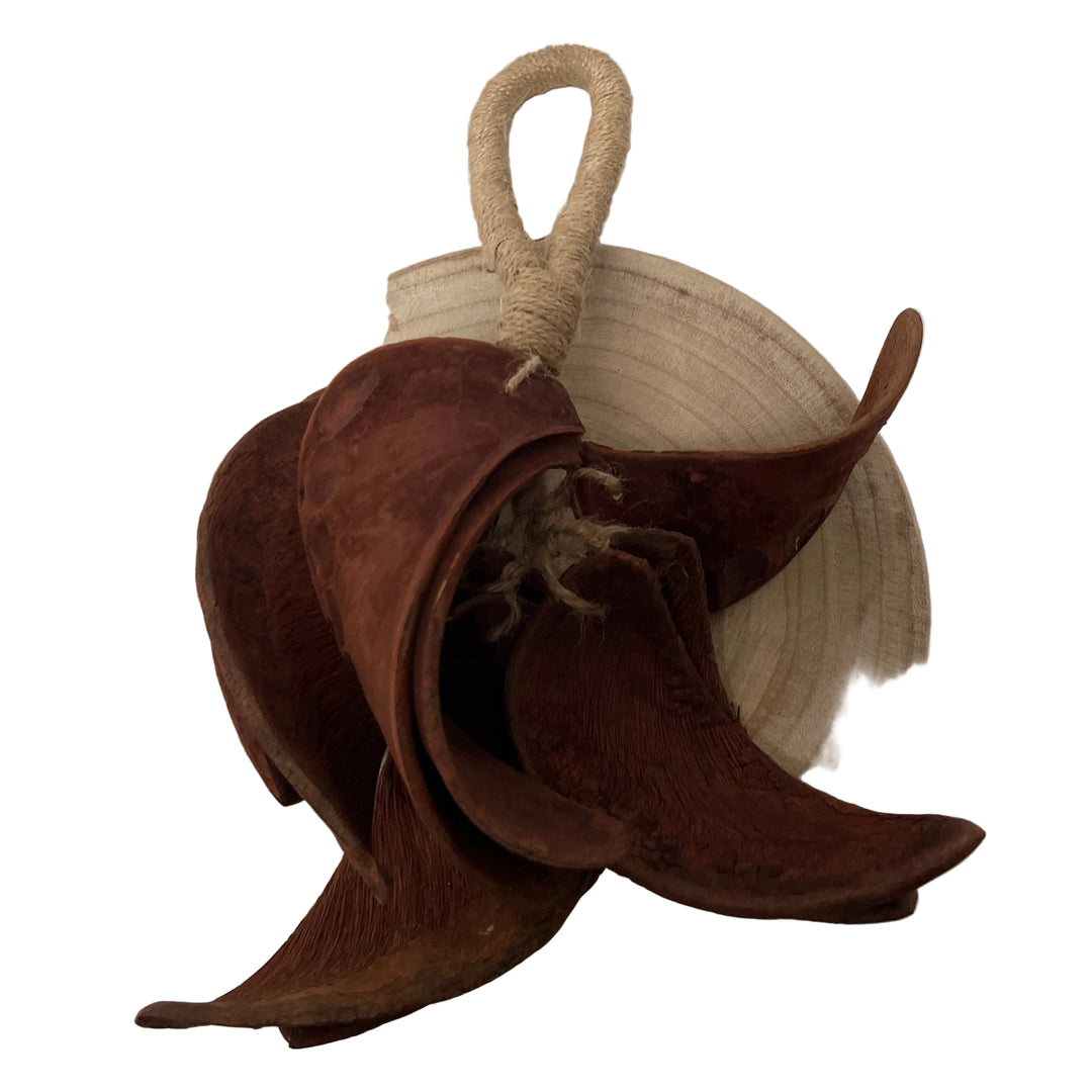 Decorative item with brown fabric and beige woven basket 