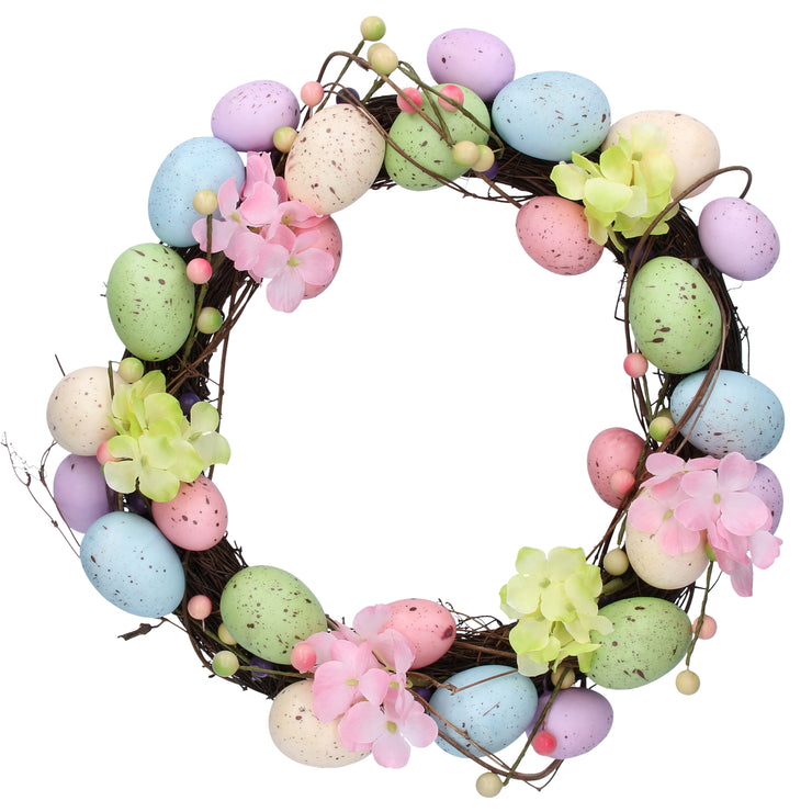 Couronne de Pâques avec œufs et fleurs pastel
