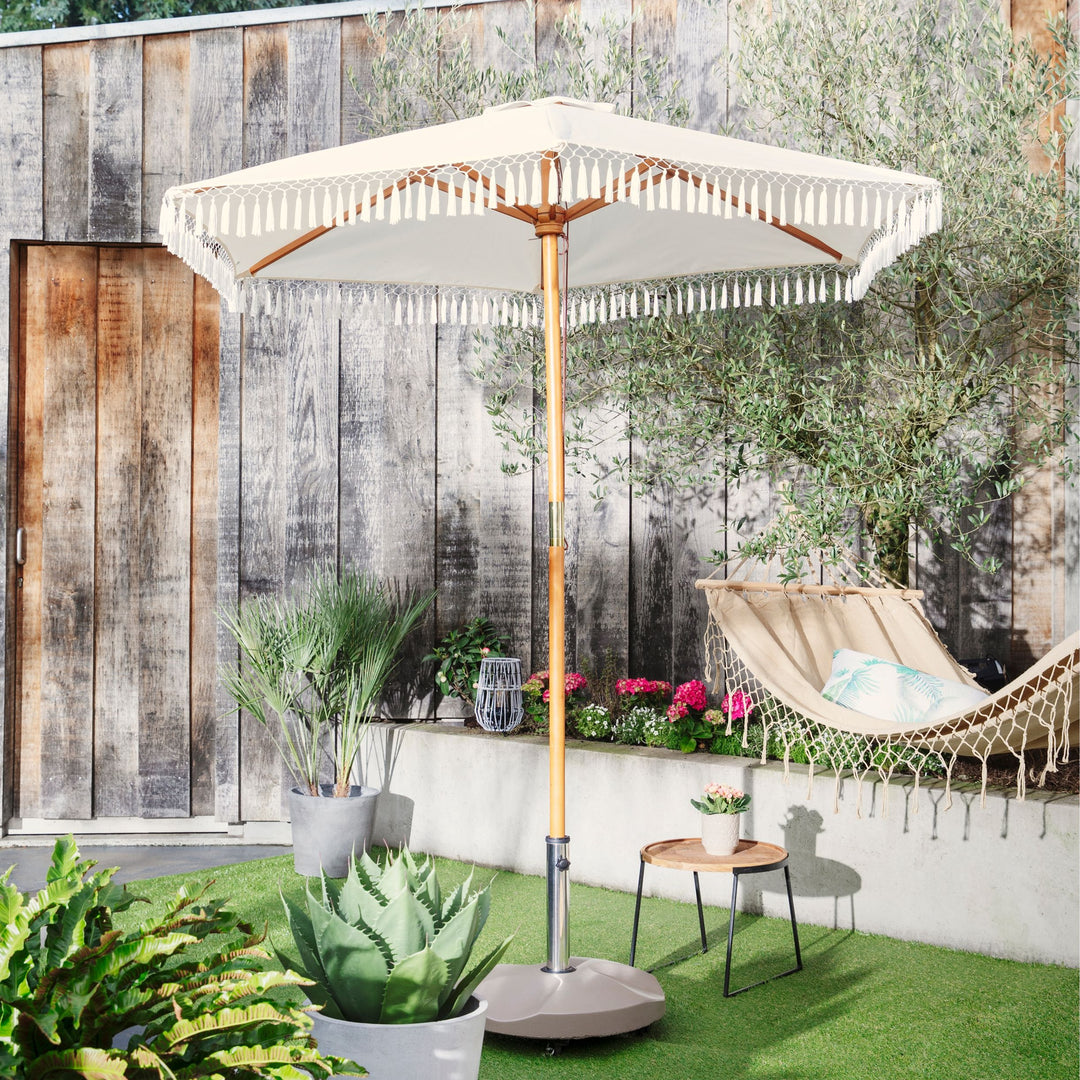 Parasol med kvastbeklædning