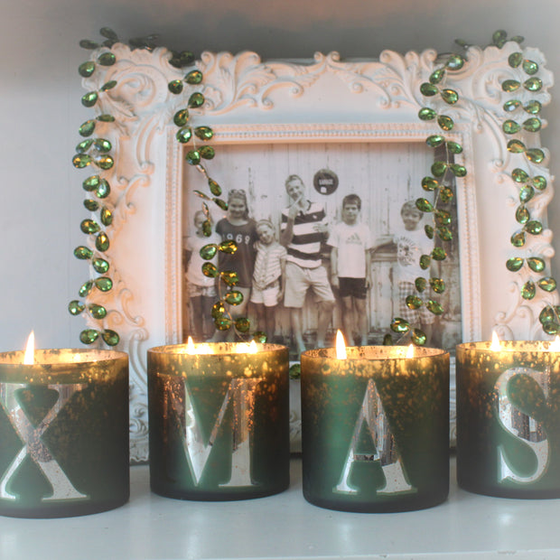 Ensemble de quatre bougies parfumées « XMAS » dans un coffret cadeau
