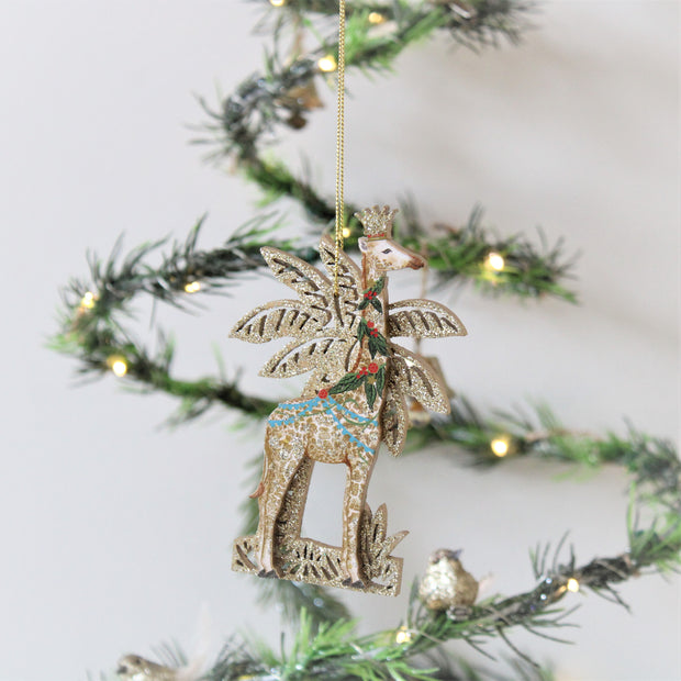 Ensemble de quatre décorations de Noël exotiques en forme de palmier à paillettes dorées