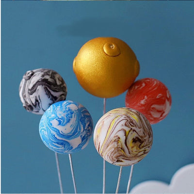 Ensemble de cinq décorations de gâteau planète